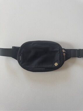 lululemon athletica Black Belt Bag with Gold Logo Accent